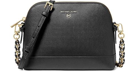 michael kors charm bag|are michael kors purses leather.